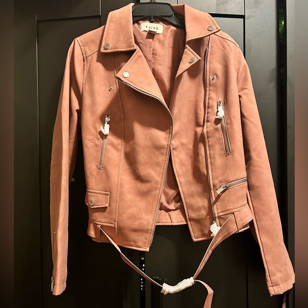 Faux leather moto jacket featuring multiple pockets & quilted detailing.